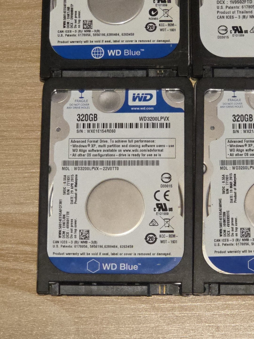 LOT 4 Western Digital WD3200LPVX 320GB 5400RPM 2.5" SATA 3.0Gb/s Hard Drives HDD