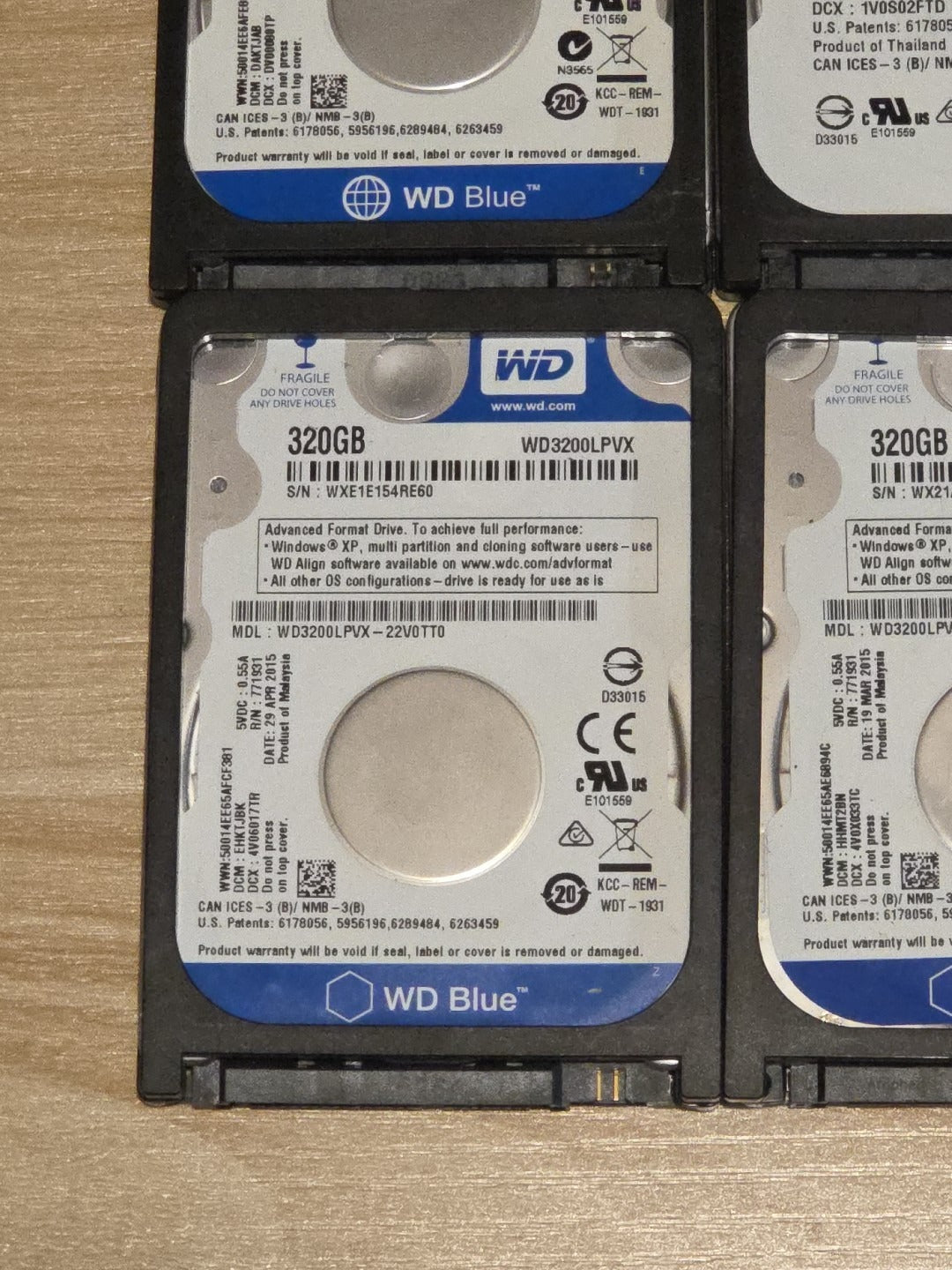 LOT 4 Western Digital WD3200LPVX 320GB 5400RPM 2.5" SATA 3.0Gb/s Hard Drives HDD