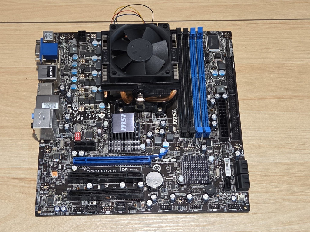 MSI 785GM-E65 Socket AM3 DDR3 Desktop mATX Motherboard w/AMD Phenom II+I/O Plate
