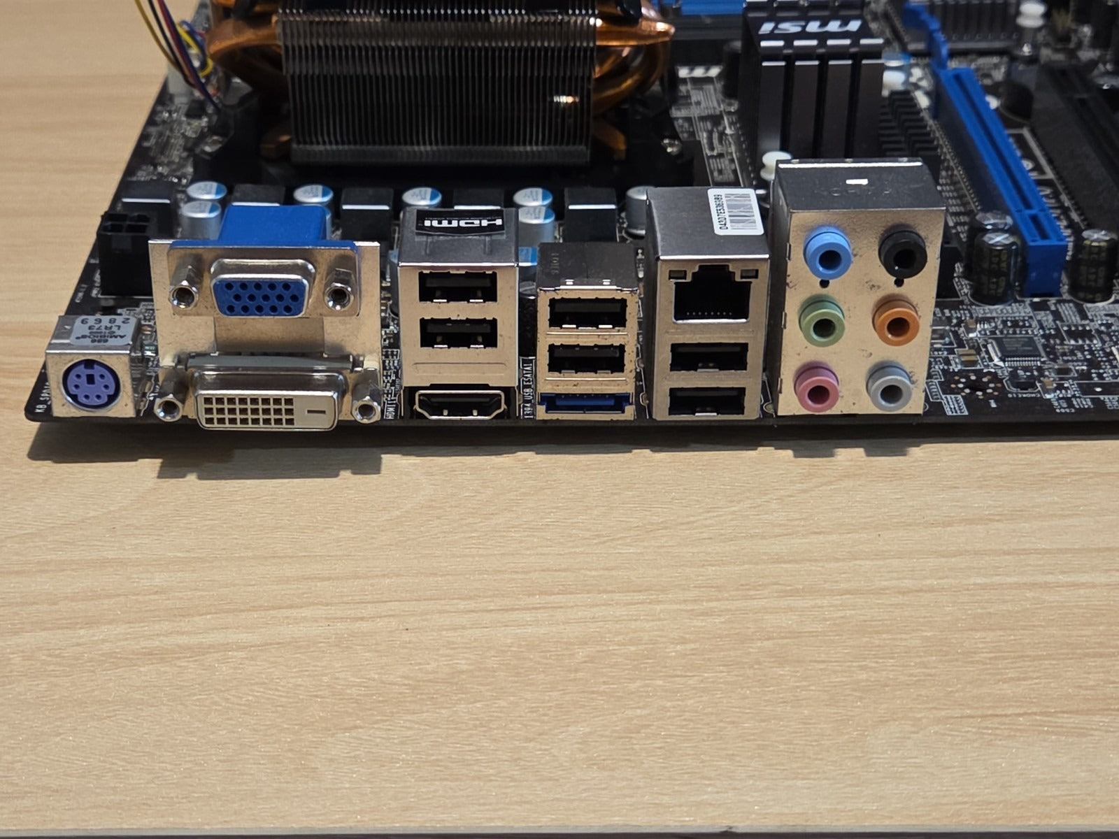 MSI 785GM-E65 Socket AM3 DDR3 Desktop mATX Motherboard w/AMD Phenom II+I/O Plate